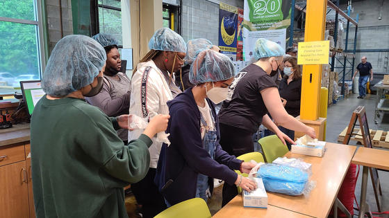 o Impact Fellows volunteering during Asheville Residency